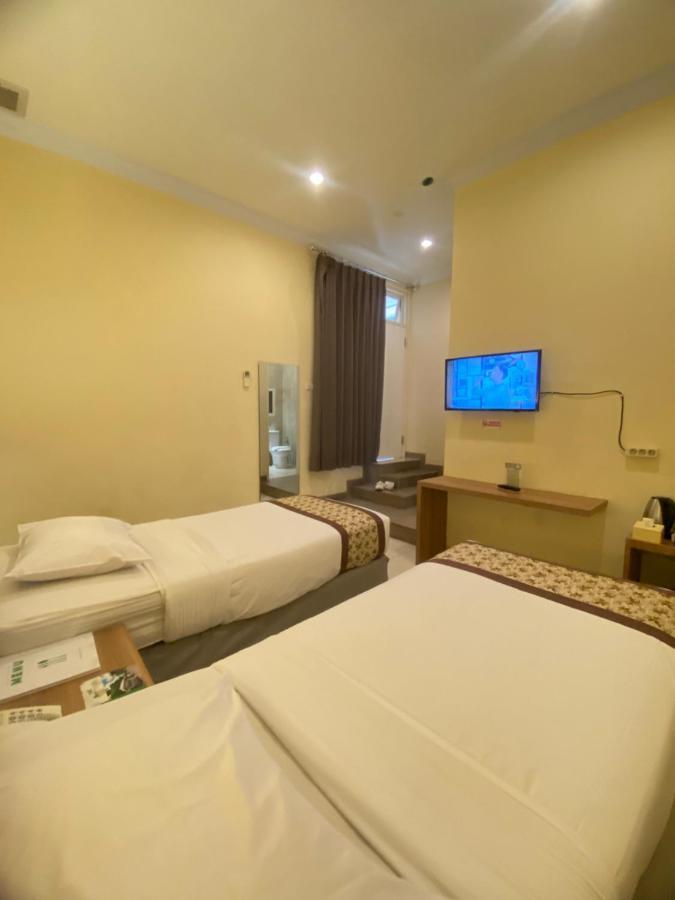 Riverstone Hotel&Cottage Batu  Buitenkant foto