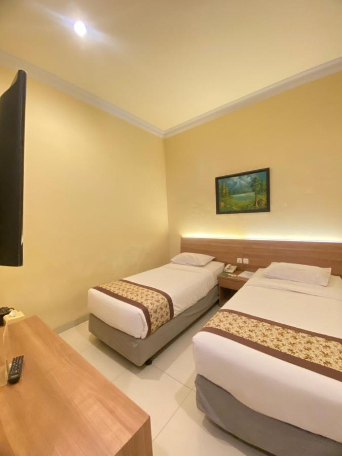 Riverstone Hotel&Cottage Batu  Buitenkant foto